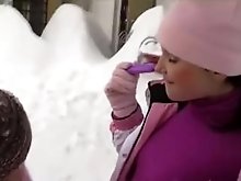 Lesbians having fun in the snow