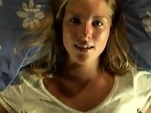 Petite blonde plays with herself on bed